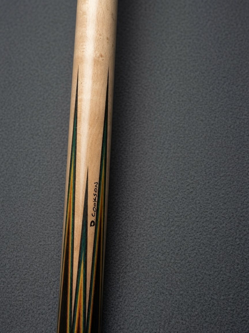 Signed D. Cookson cue with green and orange spliced points